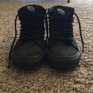 All black high top vans